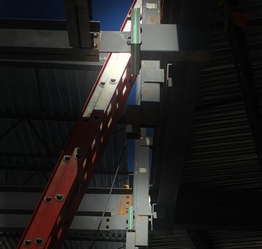 Thermal break material installed as part of a structural extension or additon